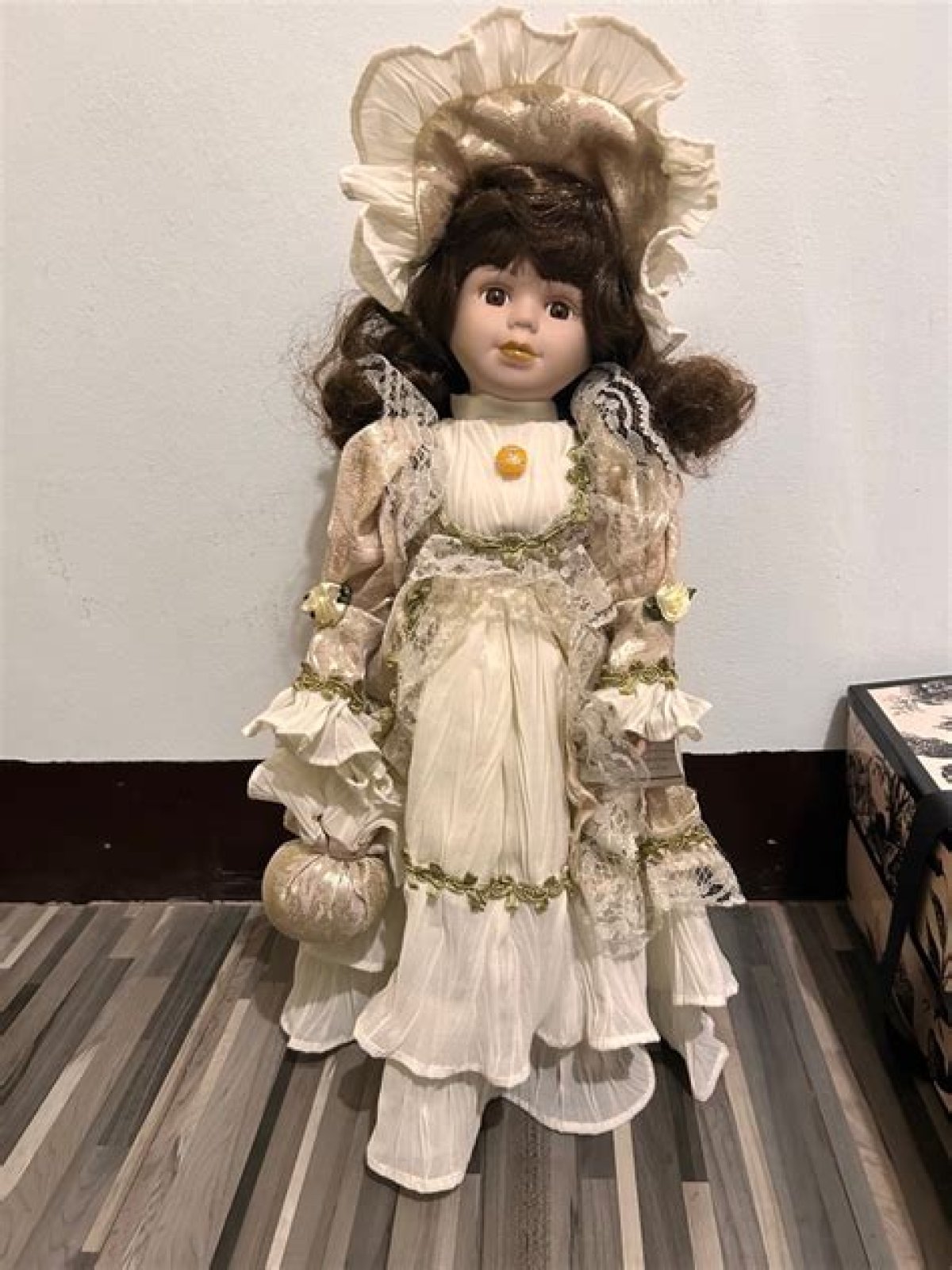 Where are the 2 holes in a porcelain doll?