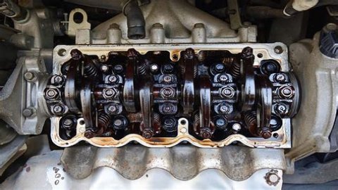 Will an oil change remove sludge?