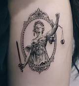 The Hidden Meaning Behind Lady Justice Tattoos: Why Millions Wear the Blindfold