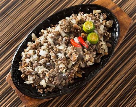 Why Real Sisig Never Sizzles: the Heated Debate Dividing Filipino Chefs